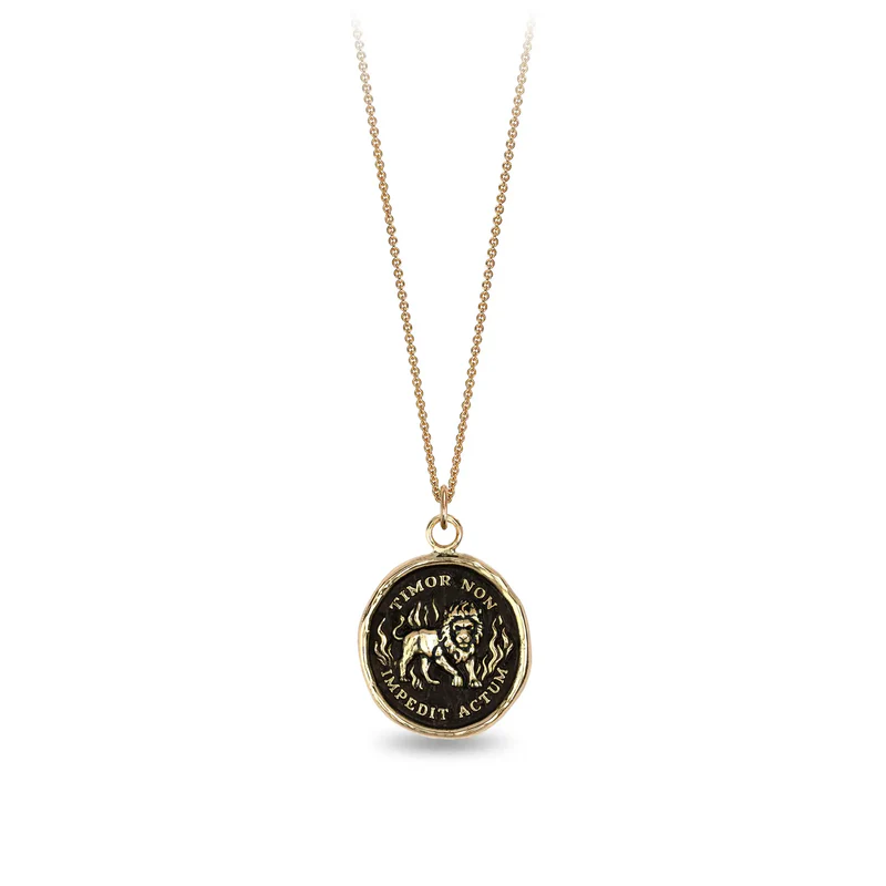 14k Yellow gold necklace with a gold talisman depicting a Lion standing around flames with the words "Timor Non Impedit Actum" wriiten around the lion