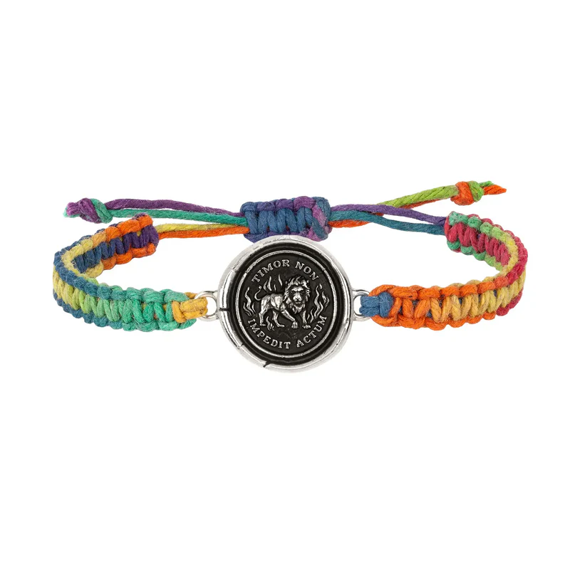 Rainbow braided Bracelet with a Sterling Silver talisman depicting a lion surrounded by flames and including the words "Timor Non Impedit Actum"