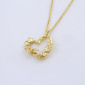 Gold Plated silver necklace with a heart pendant arranged with gold flowers