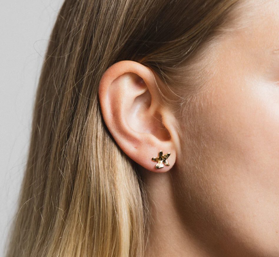14k Gold plated brass small flower studs with gold vermeil posts | on model