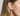 Sterling silver small flower studs with sterling silver posts  | on model