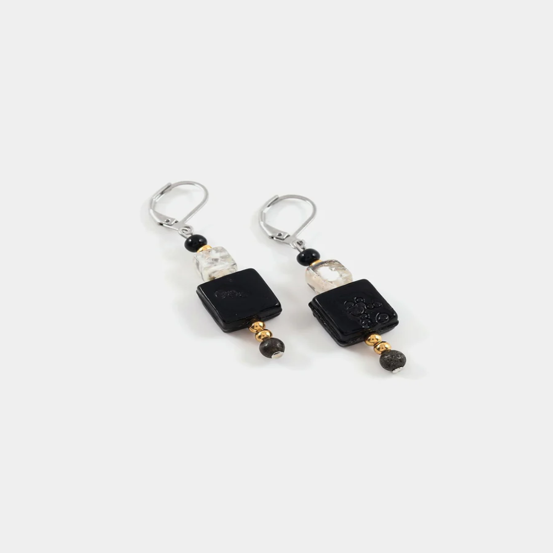 Short Two Toned earrings adorned with colorful White and Black geometric pieces