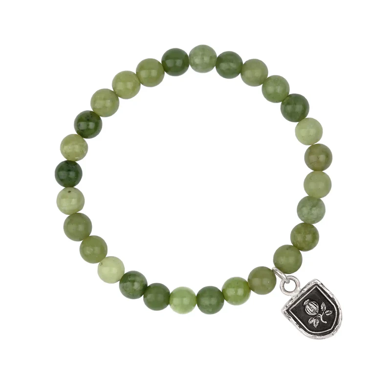 Sterling Silver Talisman Bracelet with Green Jade Beads and a talisman depicting a pomegranate plant