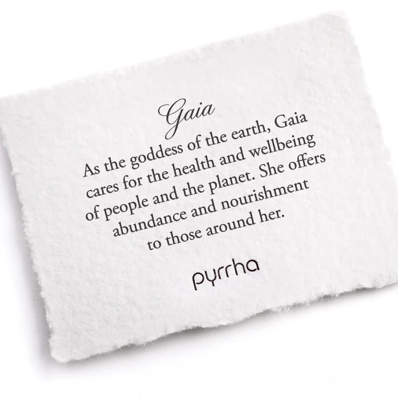 A Pyrrha note describing the Gaia Talisman. It reads, "As the goddess of the earth, Gaia cares for the health and wellbeing of people and the planet. She offers abundance and nourishment to those around her.