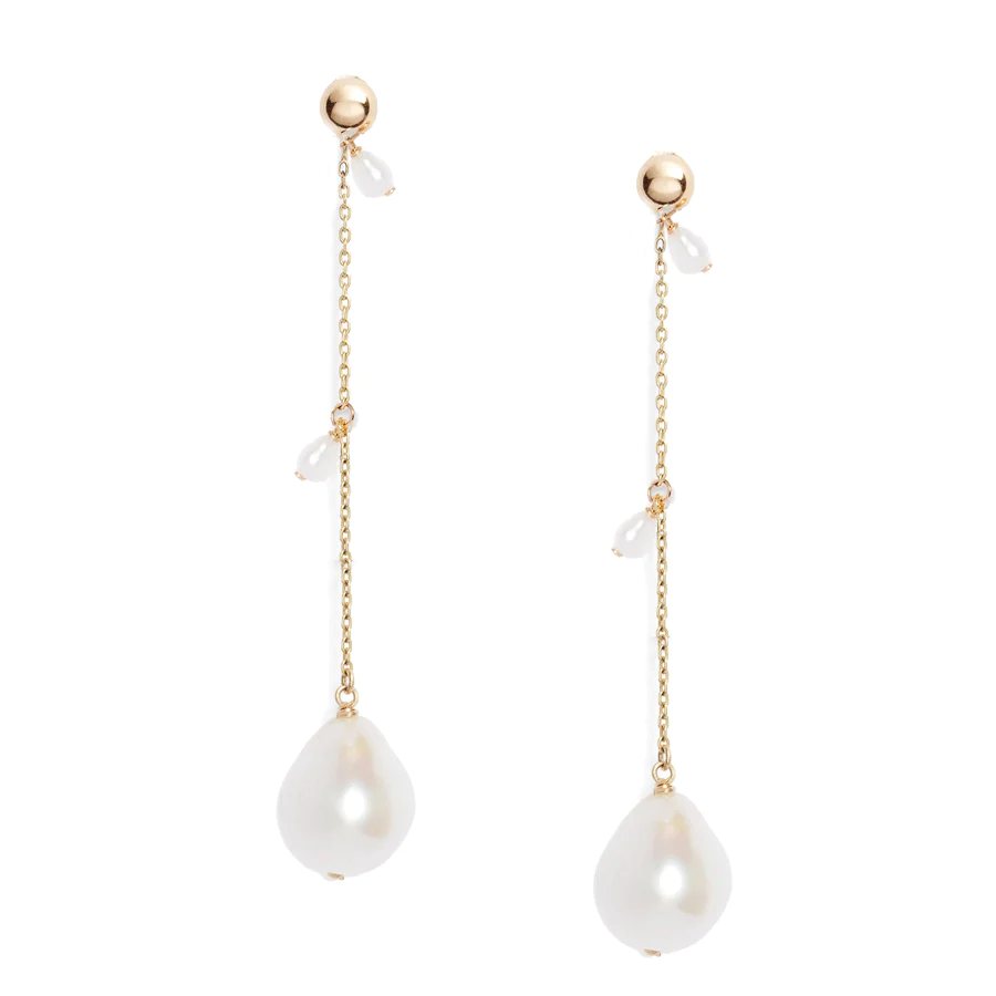 14-karat gold drop earrings with a solid gold ball earring top and a long linear baroque pearl dangle and two small keshi pearls on the side