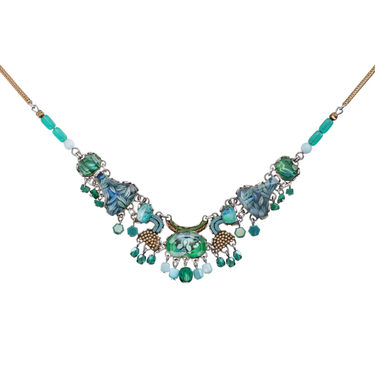 Plated Sterling Silver Necklace Featuring an Intricate Design with mixes of multicoloured Textile thread and multiple sizes of gemstones and beads. The main colours include tones of blue and green.