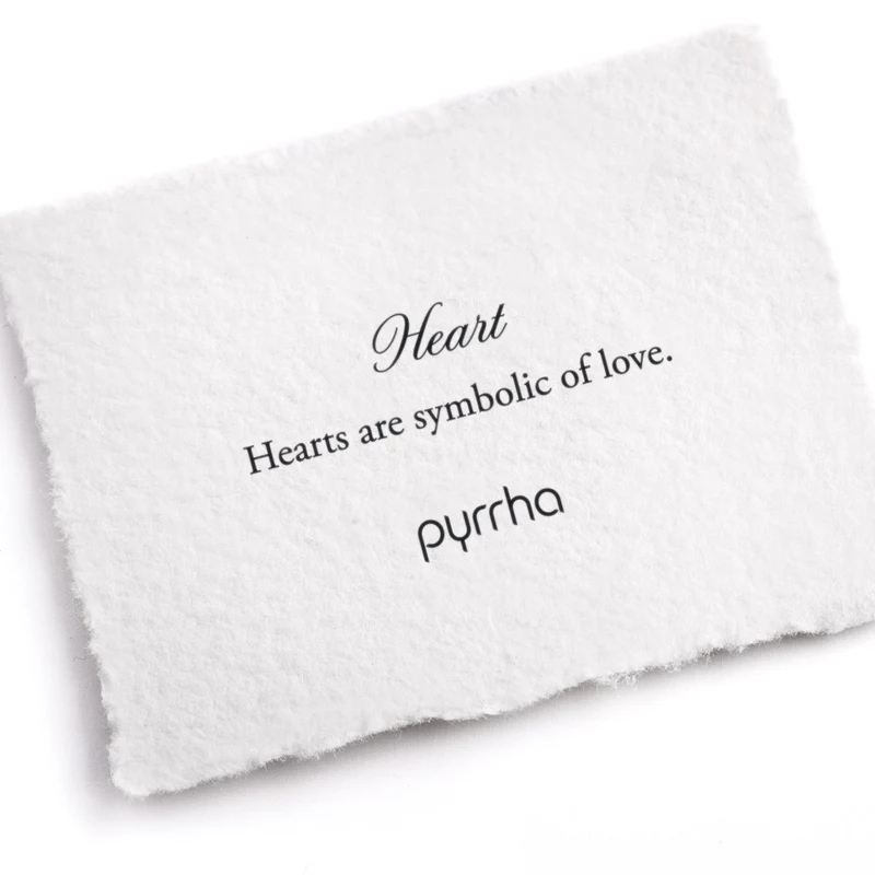 A Pyrrha note describing the Heart talisman. It reads, "Hearts are symbolic of love"
