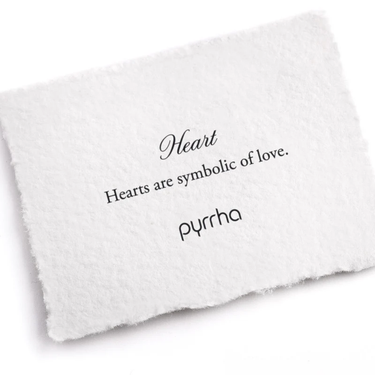 A Pyrrha note describing the Heart talisman. It reads, "Hearts are symbolic of love"