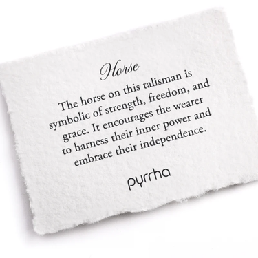 A Pyrrha note describing the Horse talisman. It reads, "The horse on this talisman is symbolic of strength, freedom, and grace. It encourages the wearer to harness their inner power and embrace their independence."