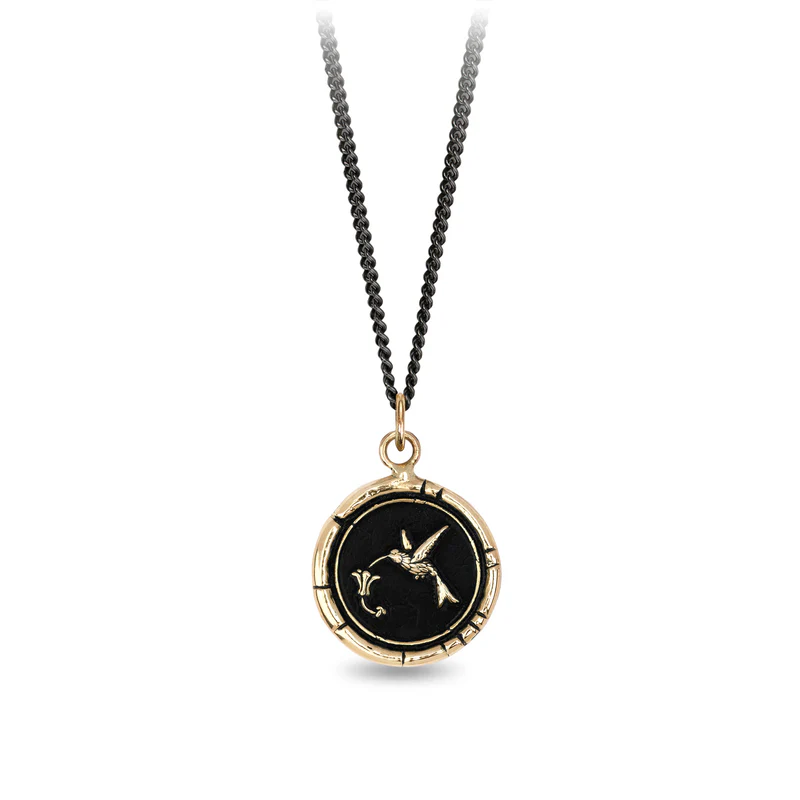 14k Gold Necklace with a Tiny hummingbird in fron of a flower on the Talisman on a Black Sterling Silver Chain