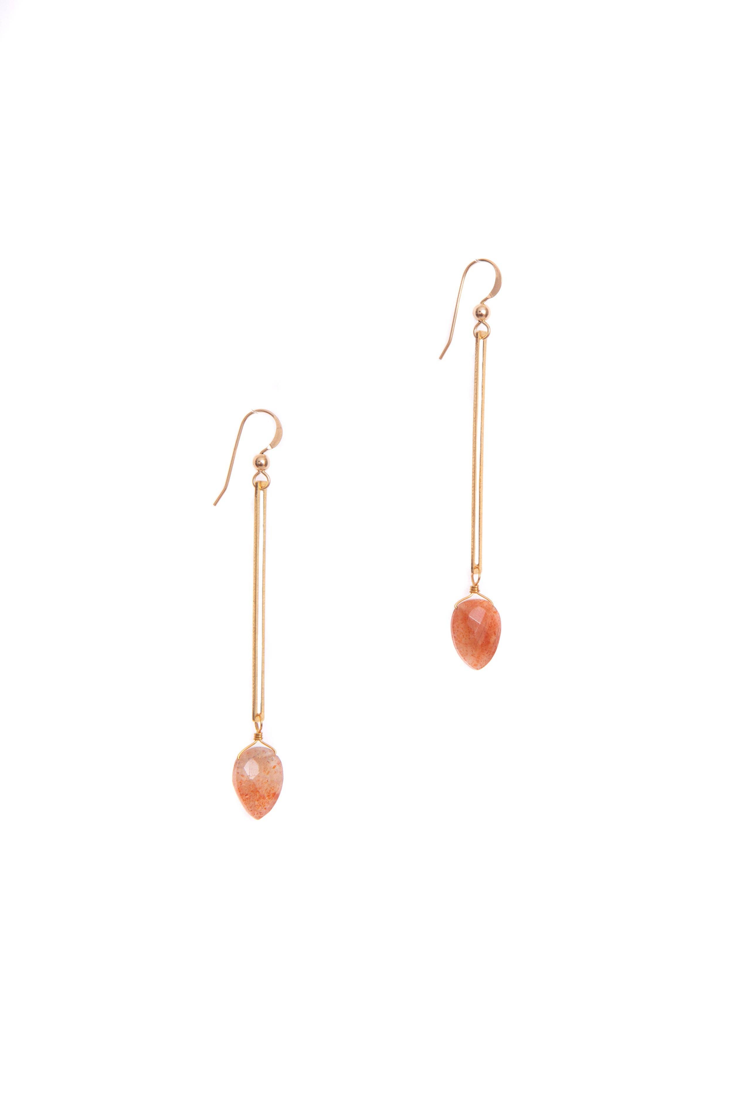 Recycled brass rectangle frames are accented with hand-cut gemstones to create the Isla Earrings. 
