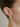 Silver Plated Rhodium Earring with White Topaz Gemstone Embedded Within | On Model