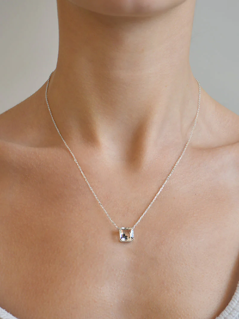 Silver Plated Rhodium Necklace with a Square Green Amethyst Gemstone Embedded Within | On Model