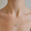 Silver Plated Rhodium Necklace with a Square Green Amethyst Gemstone Embedded Within | On Model