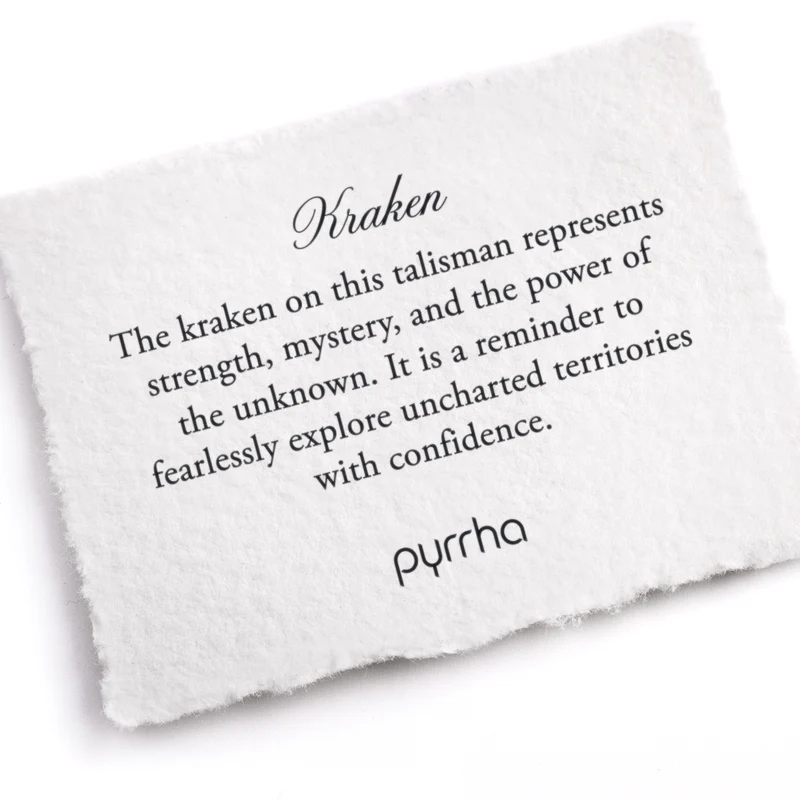 A Pyrrha note describing the kraken talisman. It reads, The kraken on this talisman represents strength, mystery, and the power of the unknown. It is a reminder to fearlessly explore uncharted territories with confidence."