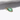 A colourful 14k Yellow Gold Emerald charm that can be worn as a standalone pendant or added to a layered stack.