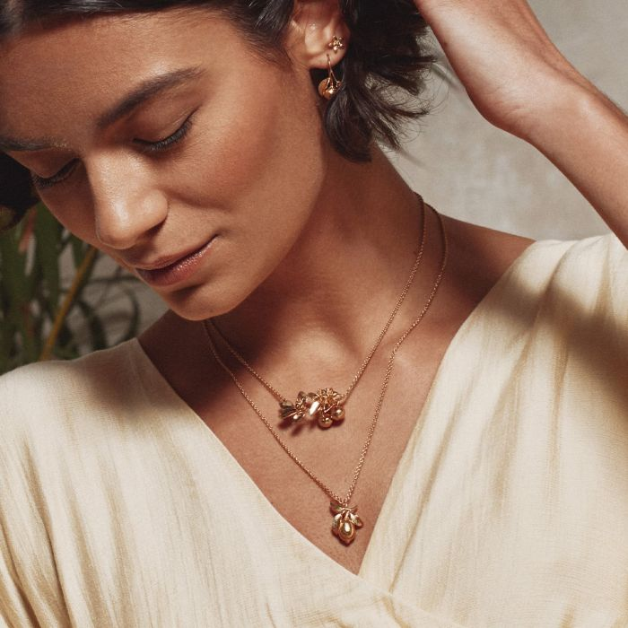 Gold Plated Silver Necklace with a Lemon Covered in Leaves