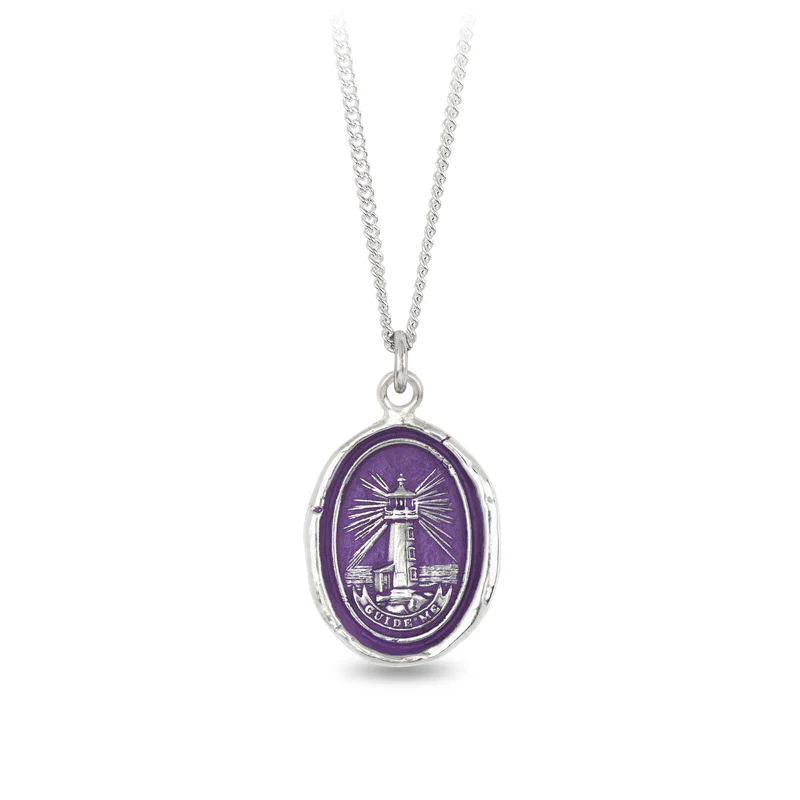 Sterling SIlver Necklace with a violet Background under a talisman depicting A Lighthouse Gleaming with light, with the words "'Guide Me" written underneath