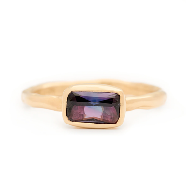 Purple sapphire with flashes of blue from Australia set in a one-of-a-kind ring mount in 14k Yellow Gold