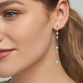 14k Yellow Gold Earrings with Pearls and turqiouse pearls strung on a long chain | on model