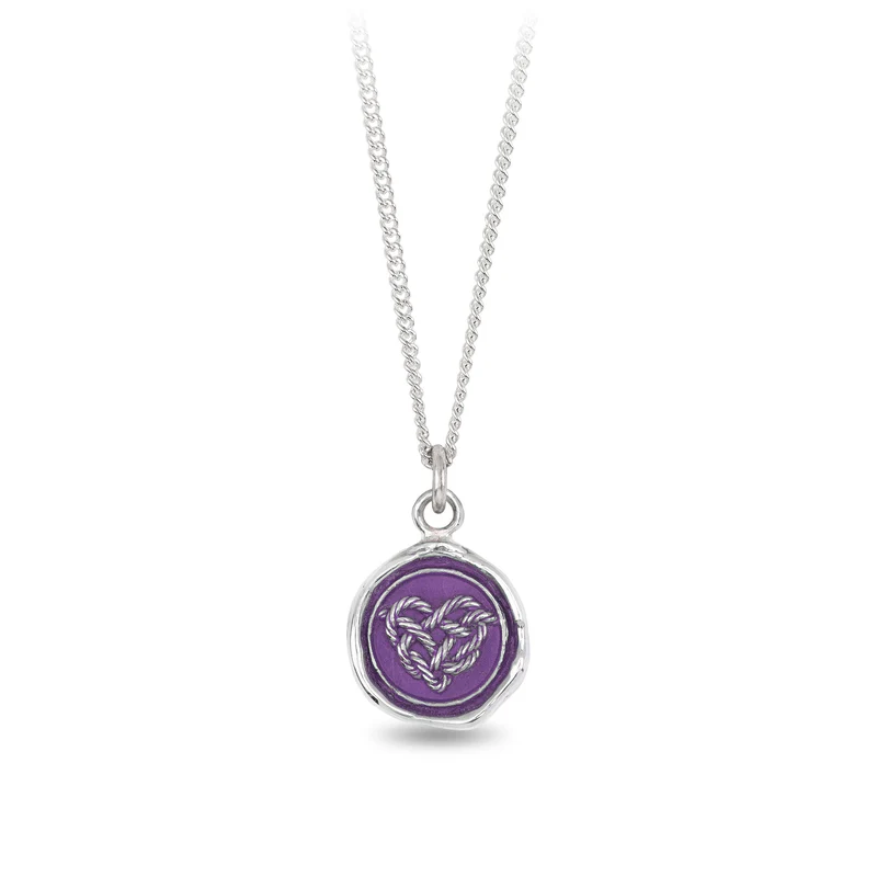 Sterling Silver Necklace with a violet background under a talisman depicting many knots tied around to form a heart shape