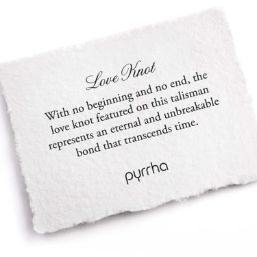 A Pyrrha Note Describing the Love Knot talisman. It reads, "With no beginning and no end, the love knot featured on this talisman represents an eternal and unbreakable bond that transcends time."
