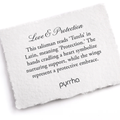 A Pyrrha note describing the Love and Protection talisman. It reads, "This talisman reads 'Tutela' in Latin, meaning 'Protection.' The hands cradling a heart symbolize nurturing support, while the wings represent a protective embrace."