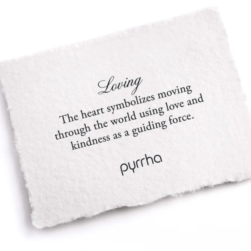 A Pyrrha note describing the Loving talisman. It reads, "The heart symbolizes moving through the world using love and kindness as a guiding force."