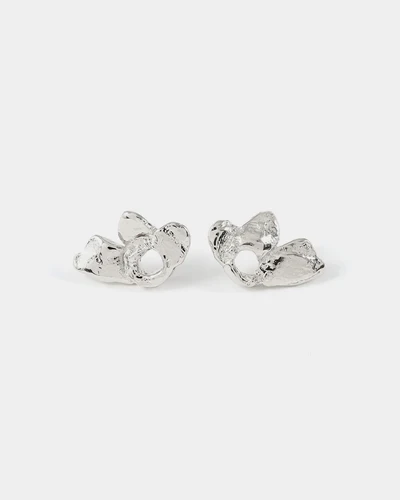 Silver floral stud earrings in pewter