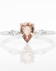 Pear-Shaped Peach Sapphire Engagement Ring with Diamond Accents