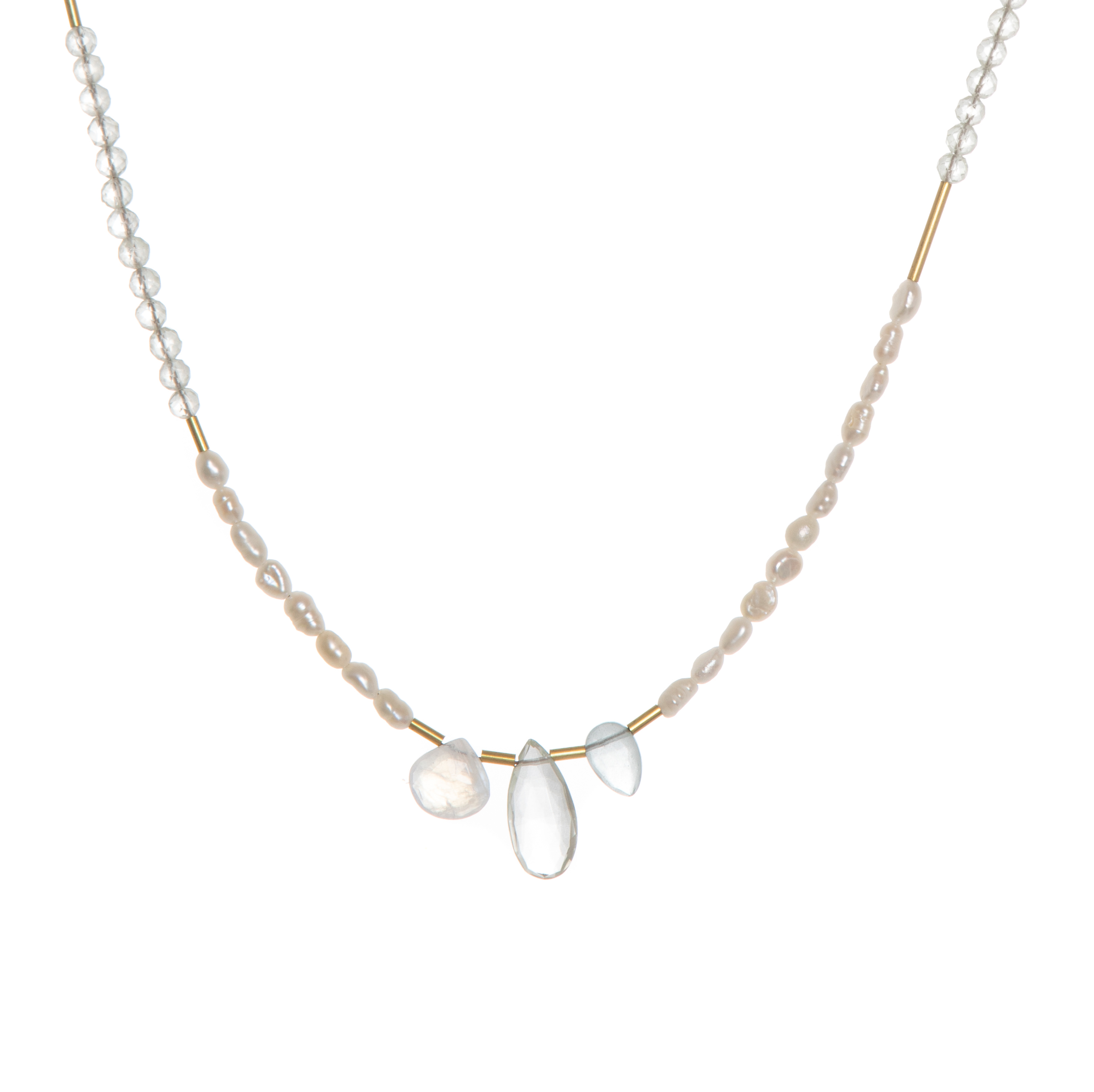 The Makani Necklace boasts hand-cut gemstones and stunning Freshwater Pearls with recycled brass accents asymmetrically spaced throughout. 