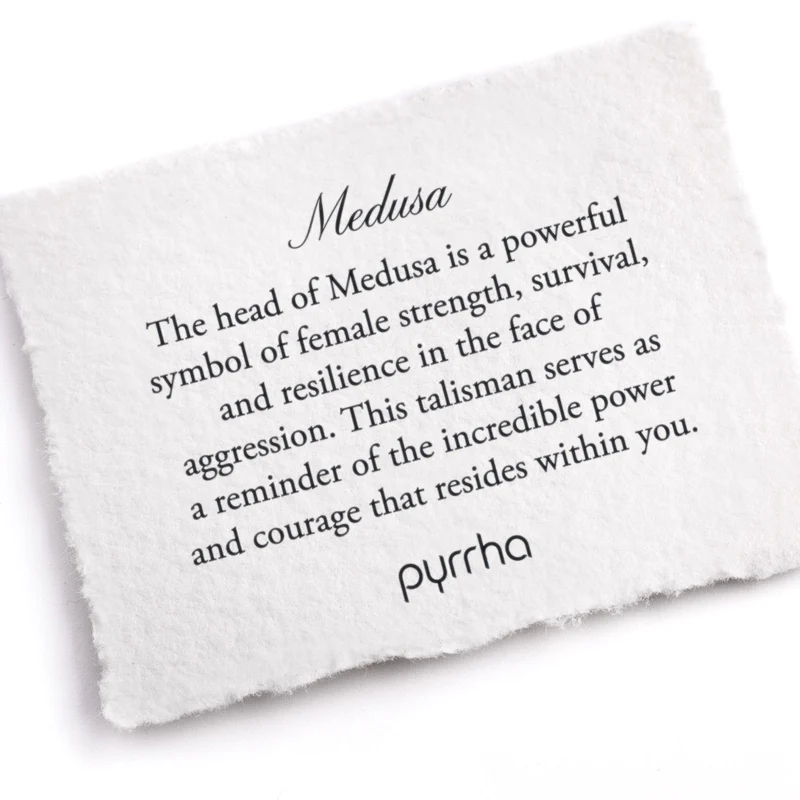 A Pyrrha Note describing the Medusa talisman. It reads, "The head of Medusa is a powerful symbol of female strength, survival, and resilience in the face of aggression. This talisman serves as a reminder of the incredible power and courage that resides within you."