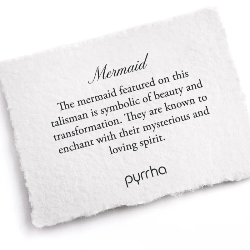 A Pyrrha Note describing the Mermaid Talisman. It reads, "The mermaid featured on this talisman is symbolic of beauty and transformation. They are known to enchant with their mysterious and loving spirit."