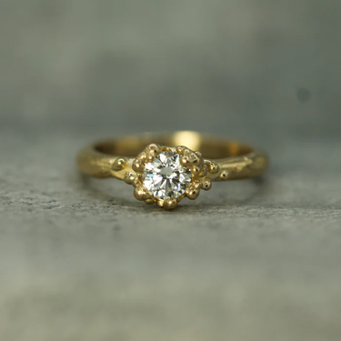 14k yellow gold Band ring with a .48ct  lab-grown diamond