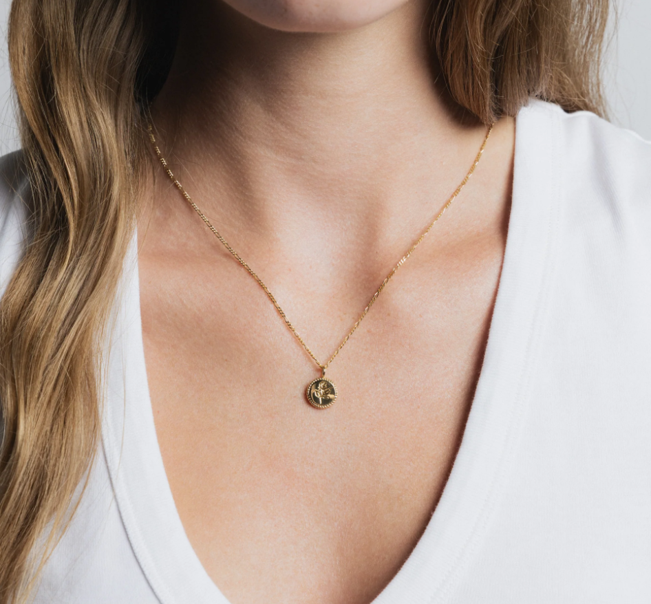 14k gold plated Brass Coin necklace with rose engraving on a Gold vermeil figaro chain | on model