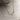 A mix of sterling silver and 14k yellow gold fill necklace splkit between a flat bar of gold, and beads of silver shaped to create a V