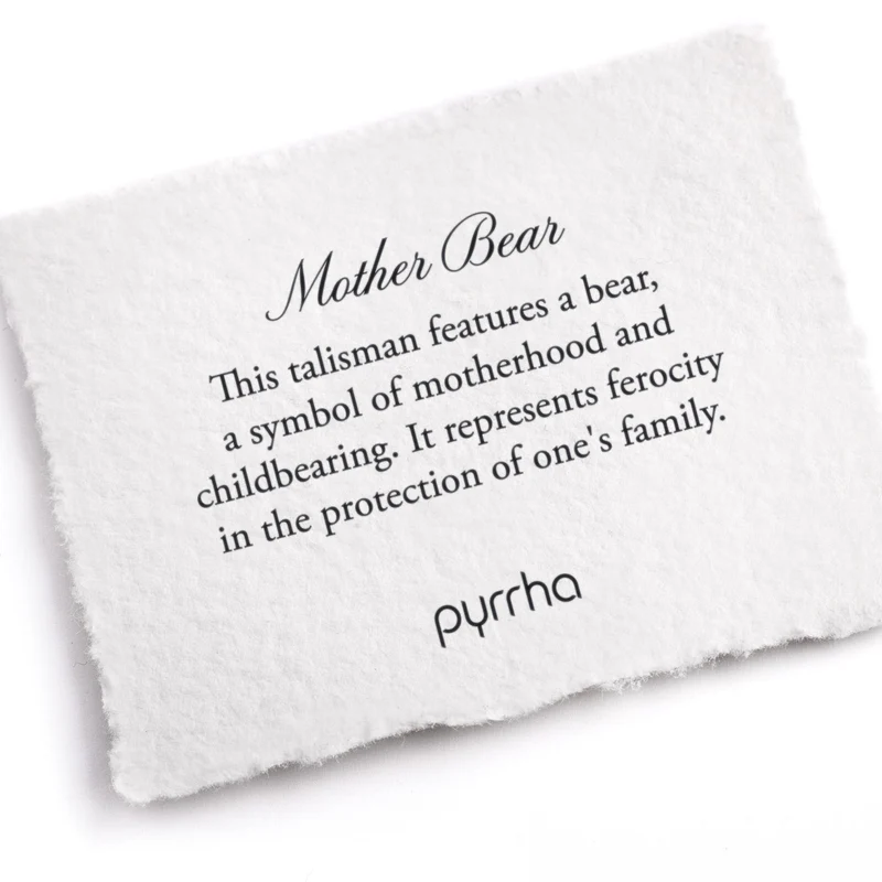 A Pyrrha note describing the Mother bear talisman. It reads, "This talisman features a bear, a symbol of motherhood and childbearing. It represents ferocity in the protection of one's family."