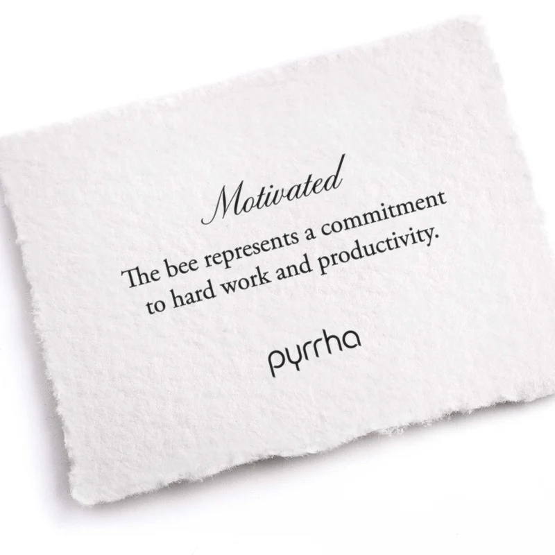 A Pyrrha note describing the MotivatedTalisman. It reads, "The bee represents a commitment to hard work and productivity."