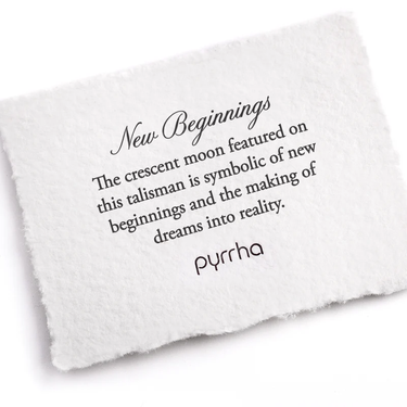 A Pyrrha Note describing the New Beginnings talisman. It reads, "The crescent moon featured on this talisman is symbolic of new beginnings and the making of dreams into reality."