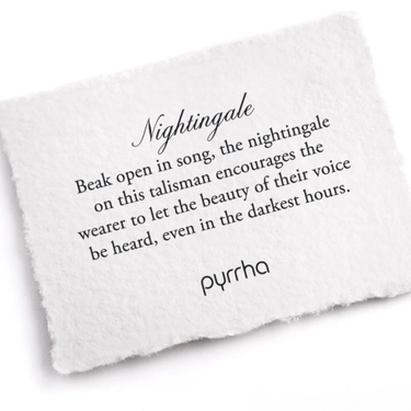 A Pyrrha Note describing the NIghtingale Talisman. It reads, "Beak open in song, the nightingale on this talisman encourages the wearer to let the beauty of their voice be heard, even in the darkest hours."