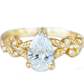 14k yellow gold ring, featuring  Certified lab diamond 0.91ct, 10 leaves and 6 accent 1.1mm diamonds