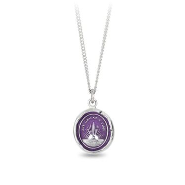Sterling SIlver Necklace with a violet Background under a talisman depicting a Bright Sunrise, with the words "One Day at a Time" Written along the top