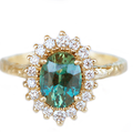14k yellow gold ring, featuring an oval teal sapphire, 1.63ct