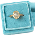Oval hazy diamond solitaire in 14k yellow gold, with a hazy rustic rosecut diamond 1.89ct