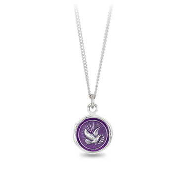 Sterling Silver Talisman With a violet background under a talisman depicting a gleaming dove