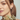 Pearl Earrings with A small round pearl combines with an organically shaped oval pearl | On model