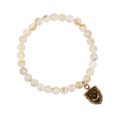 Rutilated Quartz Beaded Bracelet with a bronze talisman depicting A crescent moon below 3 stars