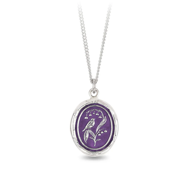 Sterling Silver necklace with a violet background under a talisman depicting a bluebird sitting on a lily of the valley plant