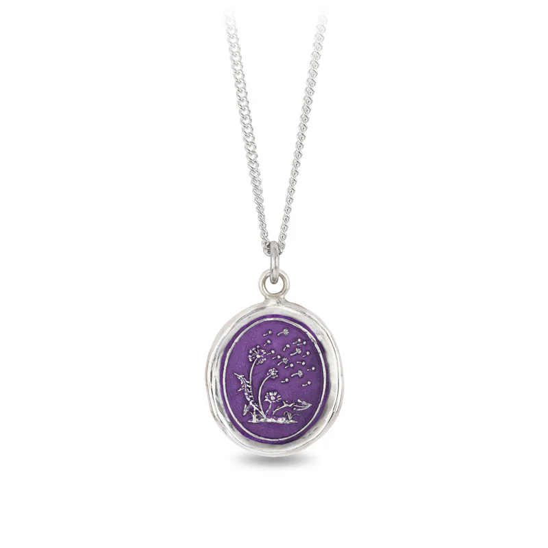 Sterling Silver Necklace with a violet background under a talisman depicting a dandelion plant flowing in the wind