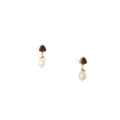 earrings featuring a gemstone trillion stud paired with a lustrous pearl nugget drop and vintage brass accen